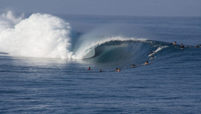 Surfing at Teahupo?o in Tahiti
