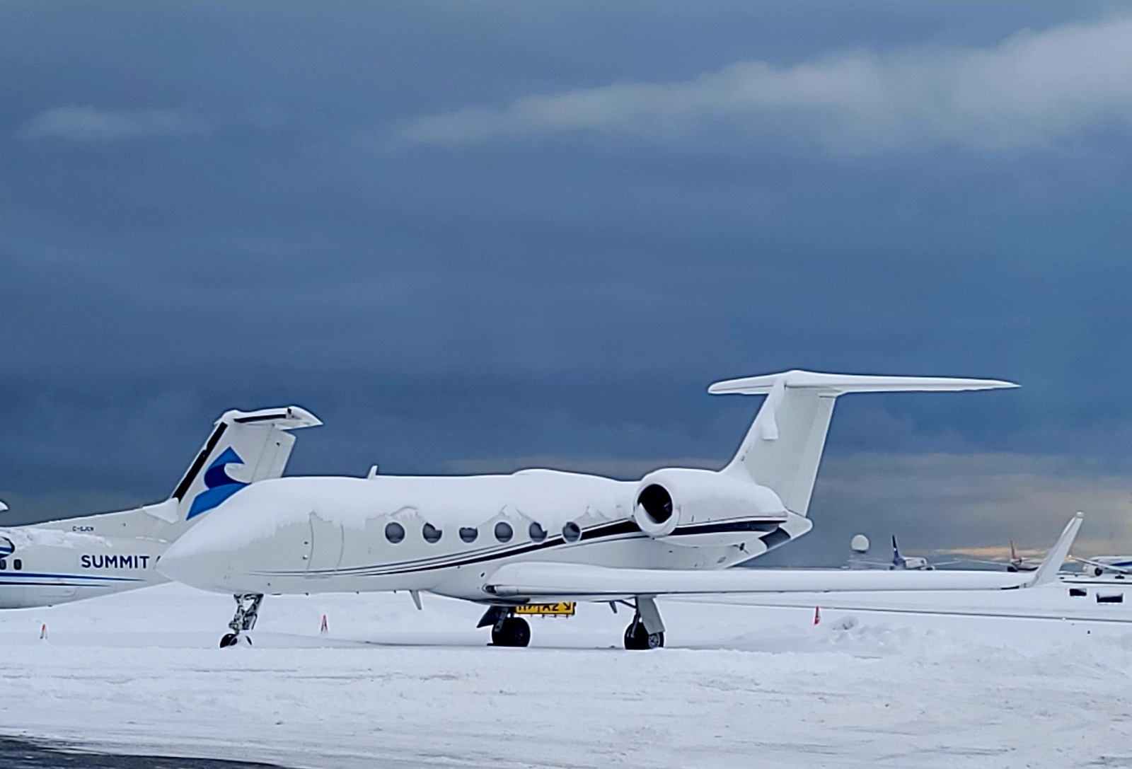 private jet covered in snow
